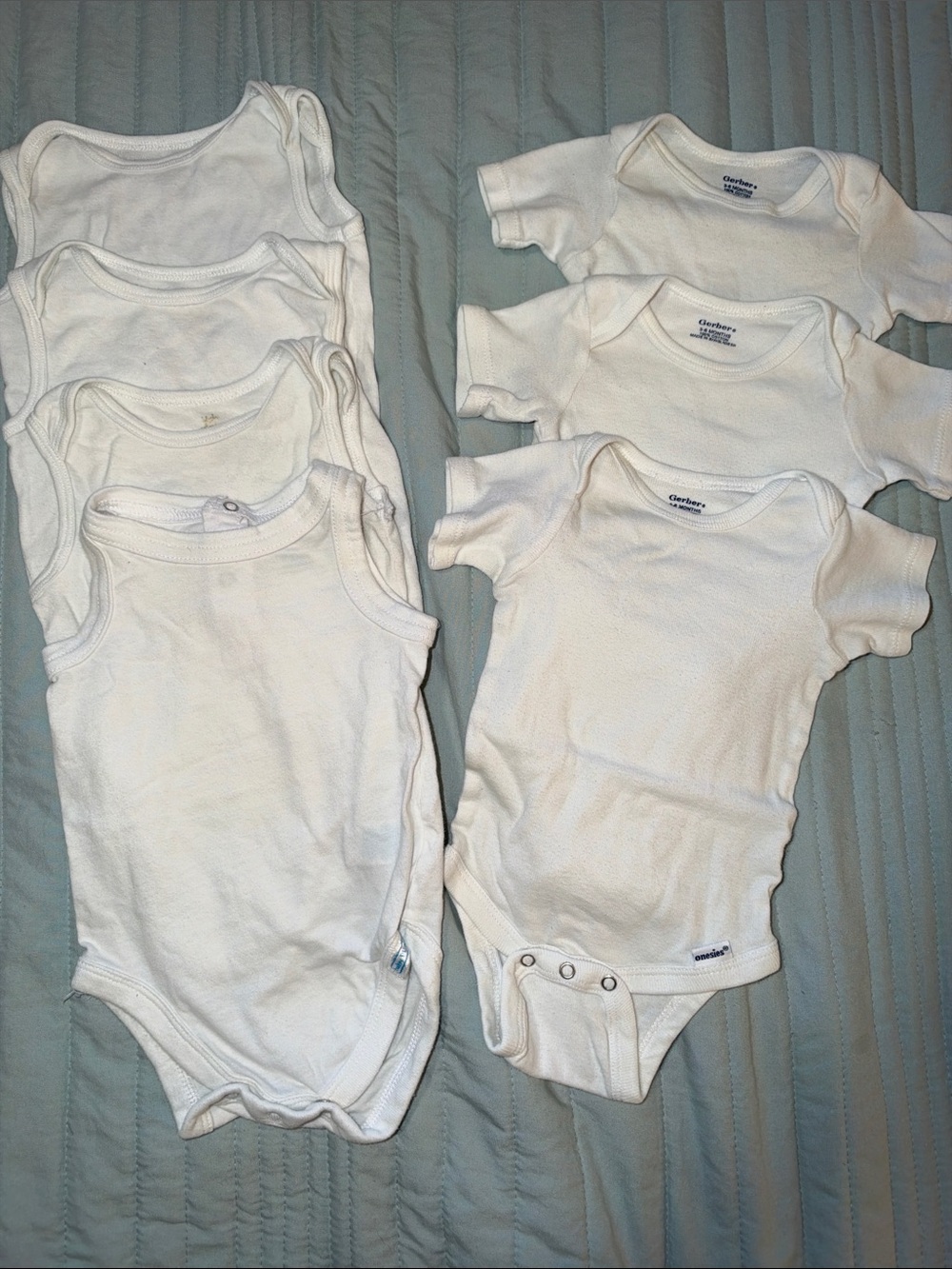 Lot of 3 Short Sleeve and 4 Sleeveless White Onesies